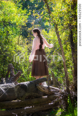 Beautiful girl dressed in the style of boho Beautiful girl dressed in the style of boho 40829500