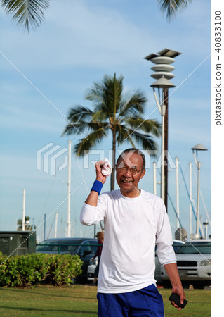Senior exercising at Waikiki Beach Senior exercising at Waikiki Beach 40833100