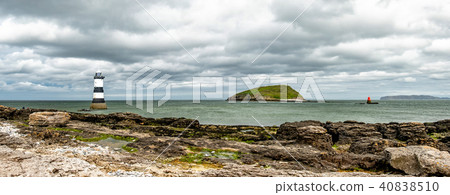 The Penmon point lighthouse is located close to Puffin Island on Anglesey, Wales - United Kingdom The Penmon point lighthouse is located close to Puffin Island on Anglesey, Wales - United Kingdom 40838510