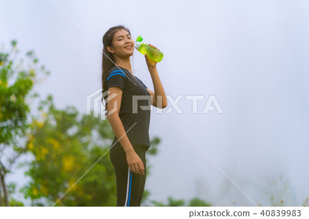 Sports girl, Woman running on road 40839983