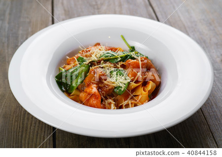 Italian pasta with smoked salmon and spinach Italian pasta with smoked salmon and spinach 40844158