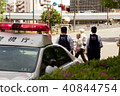 Cops watching pedestrians 40844754