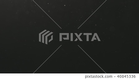 dust particles floating over black background with motion blur 40845336