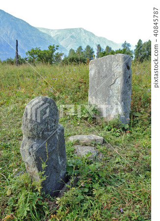 The stone statue of a balbal on the grave of an ancient warrior, 2-8 century AD The stone statue of a balbal on the grave of an ancient warrior, 2-8 century AD 40845787