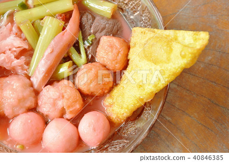 boiled fish and shrimp ball topping pickled squid boiled fish and shrimp ball topping pickled squid 40846385