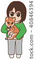 A woman holding a dog and holding a dog 40846394