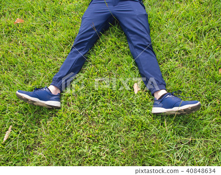 lying on the grass 40848634