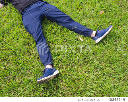 lying on the grass 40848649