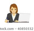 Female business man (OL) upper body writing something while looking at a personal computer 40850332