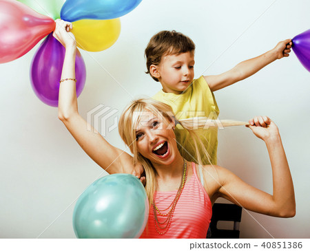 pretty real family with color balloons on white background, blon pretty real family with color balloons on white background, blon 40851386