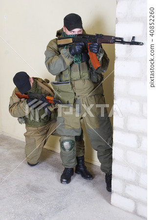rebels with AK 47 rebels with AK 47 40852260