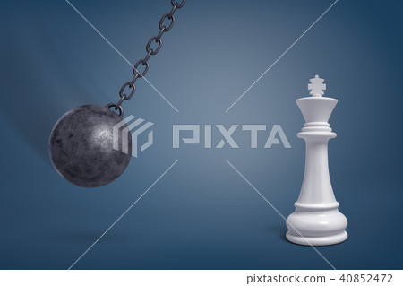 3d rendering of a giant wrecking ball swings in the direction of a large white chess king. 3d rendering of a giant wrecking ball swings in the direction of a large white chess king. 40852472
