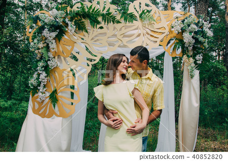 Two lovers walk around the park, kiss and hug, a Two lovers walk around the park, kiss and hug, a 40852820