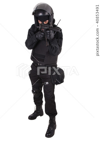 Riot police officer in black uniform Riot police officer in black uniform 40853491