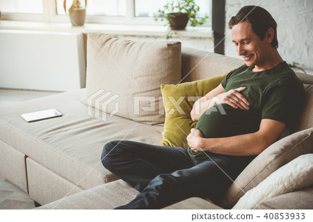 Glad future father with big abdomen Glad future father with big abdomen 40853933