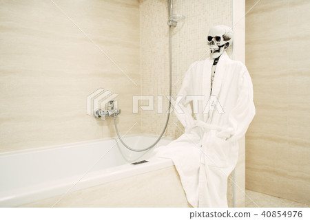Human skeleton sitting on the edge of the bath Human skeleton sitting on the edge of the bath 40854976