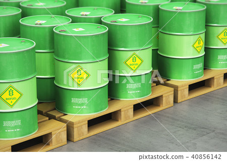 Green biofuel drums on shipping pallets in storage 40856142