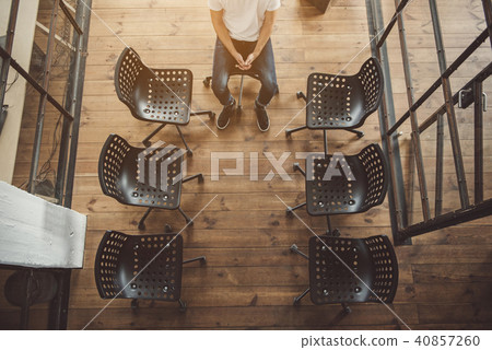 Man waiting his turn inside Man waiting his turn inside 40857260