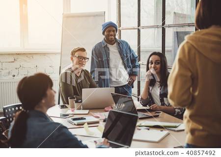 Positive partners talking during job Positive partners talking during job 40857492