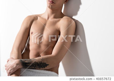 Young pleasant guy is revealing his flawless body 40857672