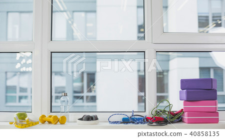 Sport equipment lying on windowsill Sport equipment lying on windowsill 40858135