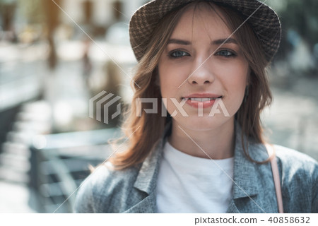 Young lady looking forward with joy outside Young lady looking forward with joy outside 40858632