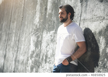 Young man enjoying calmness of warm day Young man enjoying calmness of warm day 40858925
