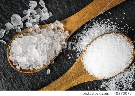 Different types of salt. Top view on two spoon 40870073