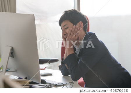 Businessman who puts on a cheeks stick young Japanese man 40870628