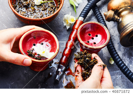Oriental tobacco hookah with floral jasmine aroma Oriental tobacco hookah with floral jasmine aroma 40871872