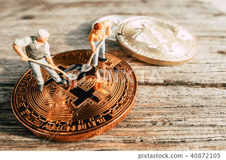 Bitcoin Mining miniature people digging Bitcoin Mining miniature people digging 40872105