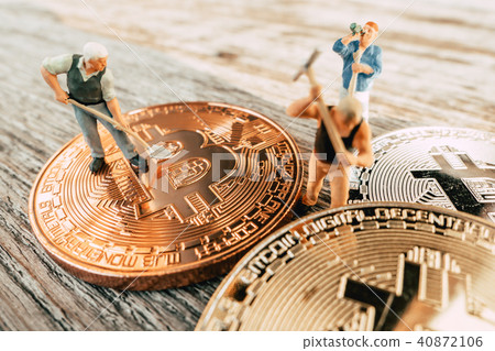 Bitcoin Mining miniature people digging Bitcoin Mining miniature people digging 40872106