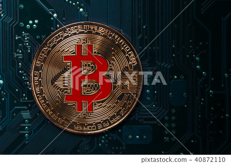 Bitcoin coin on computer electronic circuit board Bitcoin coin on computer electronic circuit board 40872110