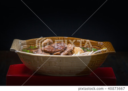 noodle pork waterfall in bowl  on black background 40873667