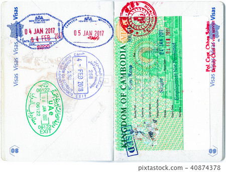 Stamps of Bahrain, UAE, Cambodia and a Cambodian visa in a French passport 40874378