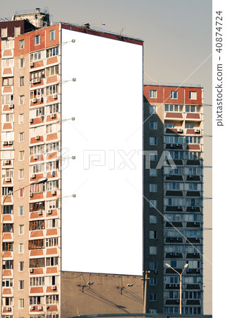 Blank vertical billboard on direct sunlight. Blank vertical billboard on direct sunlight. 40874724
