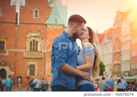 Young couple kissing on the street 40876074