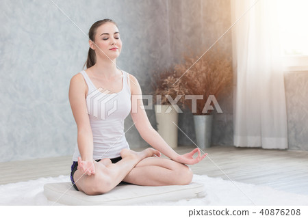 Beautiful woman Yoga sitting lotus concentration 40876208