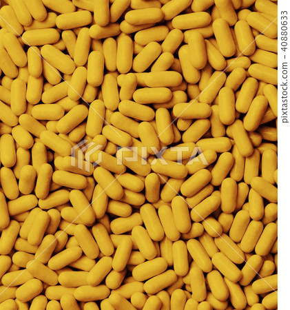 closeup of orange Tic Tacs scattered 40880633