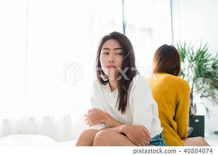 LGBT lesbian couple together indoors concept. 40884074