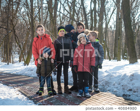 Portrait of adorable boys in winter park 40884980