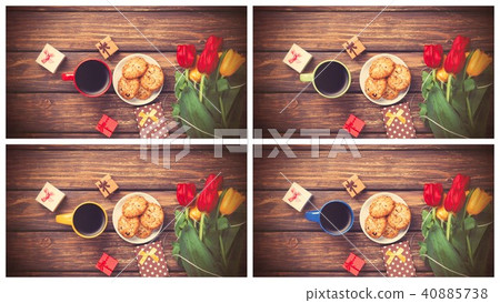 tulips bouquet and cup of coffee with cookies tulips bouquet and cup of coffee with cookies 40885738
