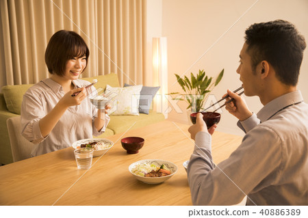 A couple eating supper A couple eating supper 40886389