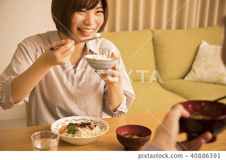 A couple eating supper A couple eating supper 40886391