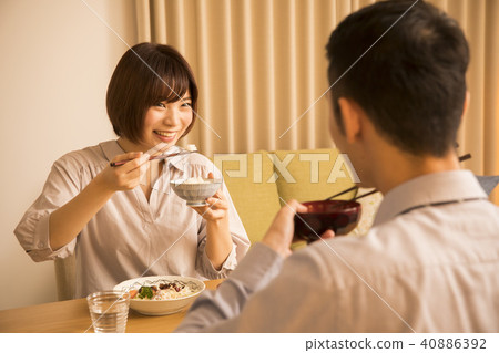 A couple eating supper A couple eating supper 40886392