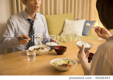 A couple eating supper A couple eating supper 40886403