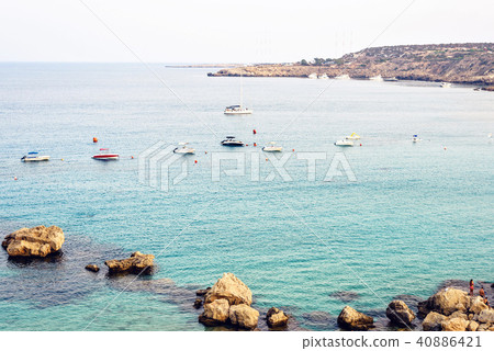 Daylight view from top to Konnos beach with people 40886421