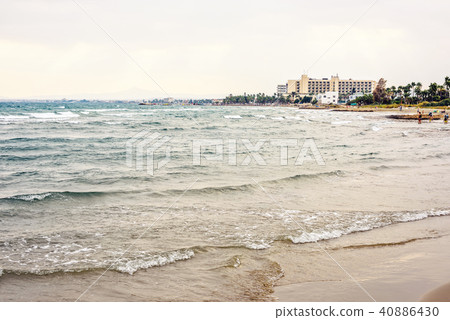 Sunset view to Nissi Beach water with waves 40886430