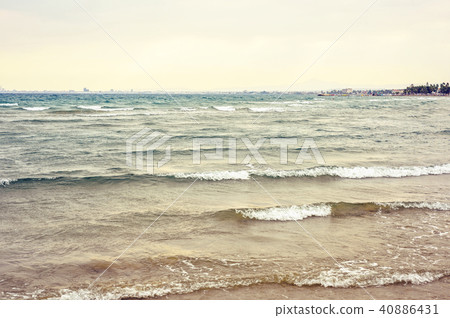Sunset view to Nissi Beach water with waves 40886431