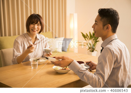 A couple eating supper A couple eating supper 40886543